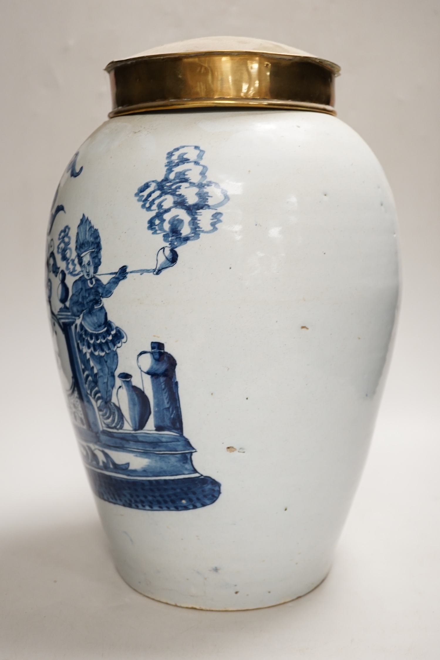 A mid 18th century Delft tobacco jar and brass cover, 36cm